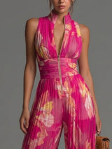 Nicole - Tuta Plissettata Floreale Fucsia