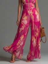Nicole - Tuta Plissettata Floreale Fucsia